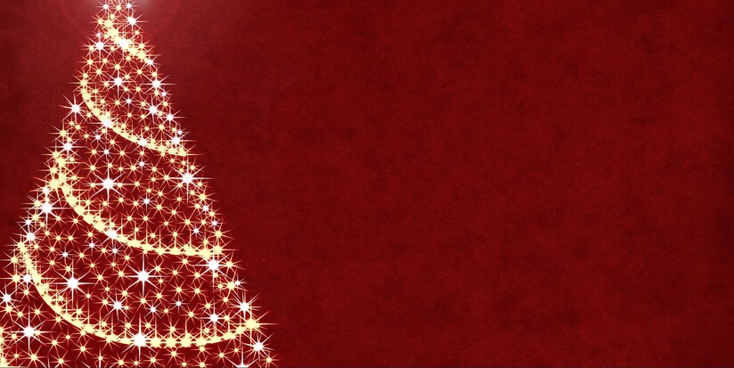 a Christmas tree with lights on a red background